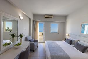 Postel nebo postele na pokoji v ubytování Almyra Resort
