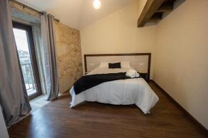 Posteľ alebo postele v izbe v ubytovaní A de Pepita, Turismo Rural en Padrón by URent + 26 fotografií