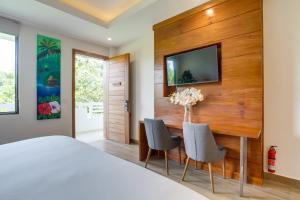 Postel nebo postele na pokoji v ubytování Belizean Dreams Resort + 37 fotografií