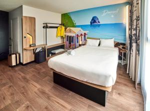 Postel nebo postele na pokoji v ubytování B&B HOTEL Fort-de-France