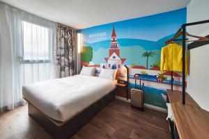 Postel nebo postele na pokoji v ubytování B&B HOTEL Fort-de-France