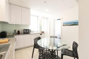 Η κουζίνα ή μικρή κουζίνα στο Apartamento Avenida +13 φωτογραφίες