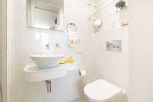 Ένα μπάνιο στο Apartamento Avenida