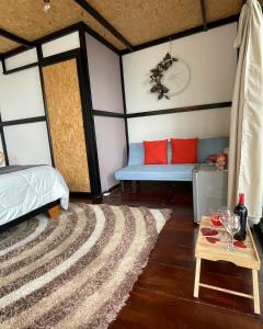 Postel nebo postele na pokoji v ubytování Balú Glamping