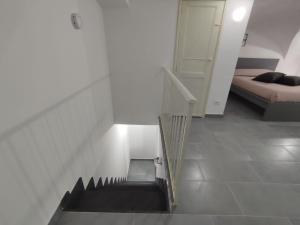 Posteľ alebo postele v izbe v ubytovaní Maya's Home