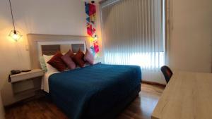 Postel nebo postele na pokoji v ubytování Hotel Aristo Gold