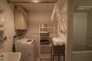 Ett badrum på Hassamu 3 Jo 1-11-1 Corole Kotoni - Vacation STAY 11468