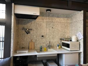 Virtuvė arba virtuvėlė apgyvendinimo įstaigoje KOU Nishijin - Vacation STAY 36633v