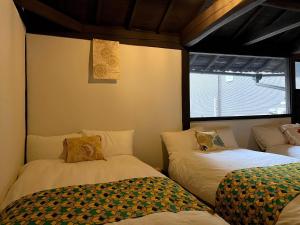 מיטה או מיטות בחדר ב-KOU Nishijin - Vacation STAY 14852v