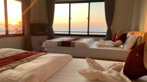 Katil atau katil-katil dalam bilik di Hotel Pristine Himalaya