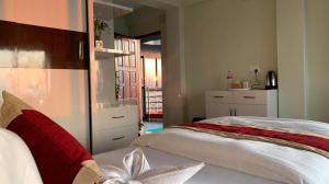 Katil atau katil-katil dalam bilik di Hotel Pristine Himalaya