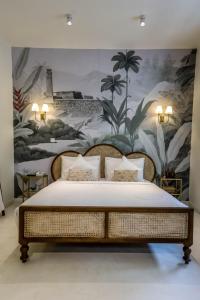 Säng eller sängar i ett rum på Galle Fort Hotel