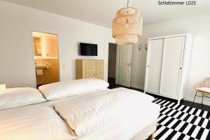 Ein Bett oder Betten in einem Zimmer der Unterkunft Haus Lieke Deeler