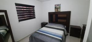 Postel nebo postele na pokoji v ubytování Casa Mina la prieta