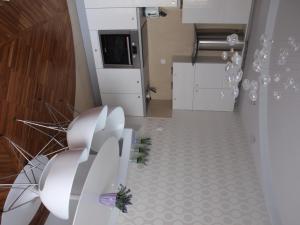 Kuchyň nebo kuchyňský kout v ubytování Apartament Lawendowy + 6 fotografií