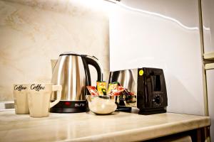 Coffee and tea making facilities at Sunflower Apartment City Center