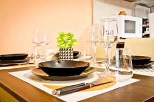 A kitchen or kitchenette at Sunflower Apartment City Center