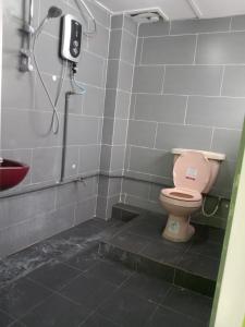 Vonios kambarys apgyvendinimo įstaigoje Netasha holiday inn and apartment