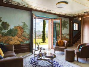 A seating area at Belvilla by OYO Tamburina