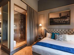 A bed or beds in a room at Belvilla by OYO Tamburina