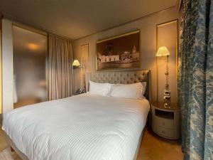 A bed or beds in a room at Belvilla by OYO Tamburina