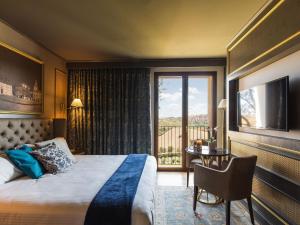 A bed or beds in a room at Belvilla by OYO Tamburina