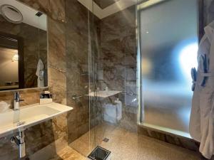 A bathroom at Belvilla by OYO Tamburina