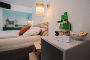 Postel nebo postele na pokoji v ubytování Hotel Petřín