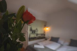 Postel nebo postele na pokoji v ubytování Hotel Petřín