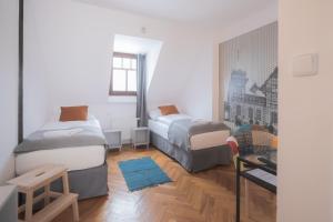 Voodi või voodid majutusasutuse hotel Petřín toas