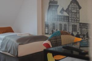 Postel nebo postele na pokoji v ubytování Hotel Petřín