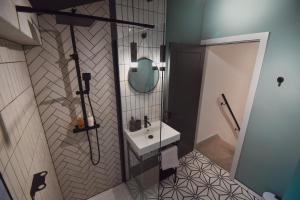 a bathroom with a sink and a mirror at Central Stays - Luxury 3 Bedroom House in Central Chester SLEEPS 6 in Chester +19 photos
