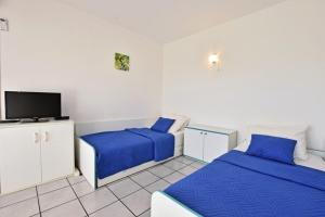 Posteľ alebo postele v izbe v ubytovaní Apartment in Porec with balcony, WiFi 819-3 + 37 fotografií