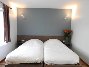 Postel nebo postele na pokoji v ubytování Au Bon Gîte