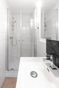 Ένα μπάνιο στο Appartements an der Therme