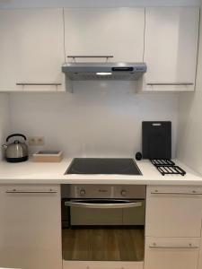Kuhinja ili čajna kuhinja u objektu Residentie Nouna