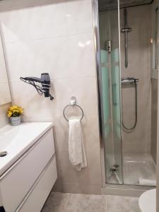 a bathroom with a shower and a sink at Apartment Llavaneres I in Sant Andreu de Llavaneres
