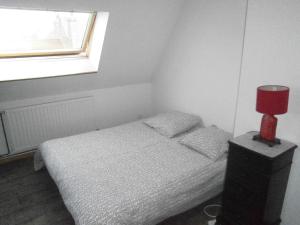 Postel nebo postele na pokoji v ubytování Bruneval House