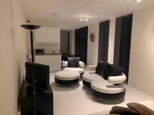 Posezení v ubytování Prachtige gastsuite in Ranst "Studio 34"