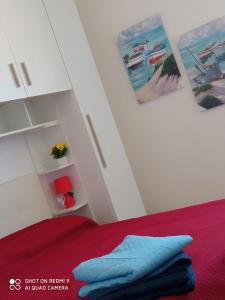 Postel nebo postele na pokoji v ubytování Mamalina Residence