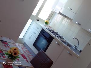 Kuchyň nebo kuchyňský kout v ubytování Mamalina Residence