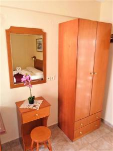 A bed or beds in a room at Apartmenthotel Sithon