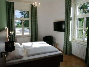 Кровать или кровати в номере Glögglhof