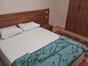 Ліжко або ліжка в номері Karayel Apart Hotel