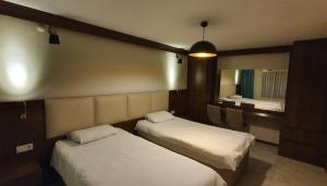 Postel nebo postele na pokoji v ubytování Villa Da Otel + 37 fotografií