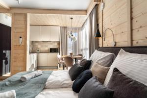 Кровать или кровати в номере Rezydencja Boutique SKI - 200m do Term Bania Odkryj Białkę +44 фотографии