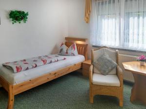 Giường trong phòng chung tại Holiday Home Schneider by Interhome