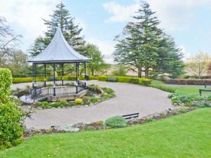 a gazebo in the middle of a park at Baytree Apartment in Grange Over Sands