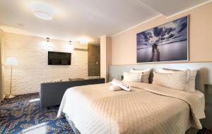 Posteľ alebo postele v izbe v ubytovaní JJ Sport Concept Hotel + 37 fotografií
