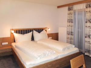 Ένα ή περισσότερα κρεβάτια σε δωμάτιο στο Apartment Alpenherz-1 by Interhome +14 φωτογραφίες